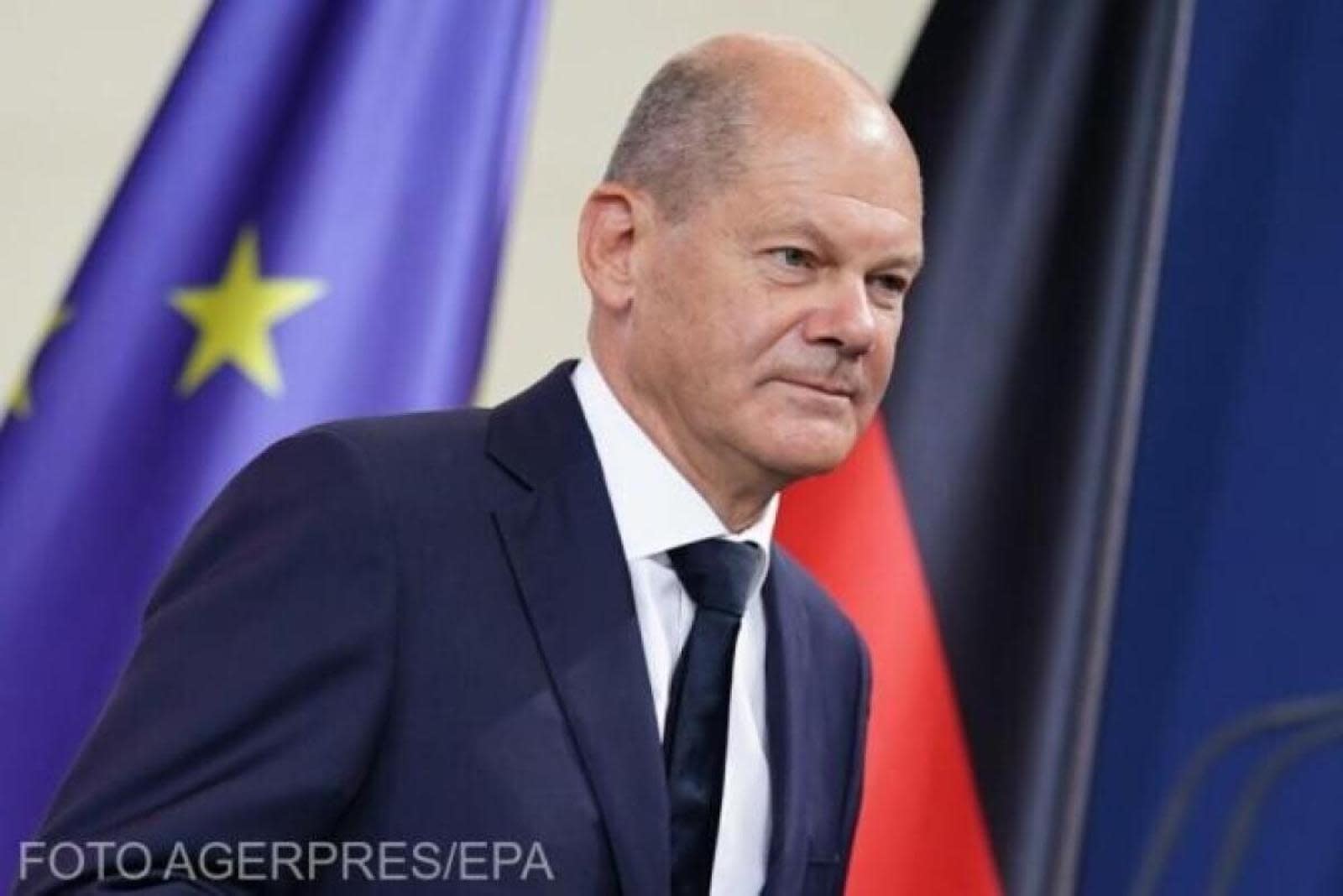 Amendat pentru un gest „afectuos”. Sub influența drogurilor, i-a strâns mâna și l-a îmbrățișat pe Olaf Scholz: Amendă de 4.500 de euro